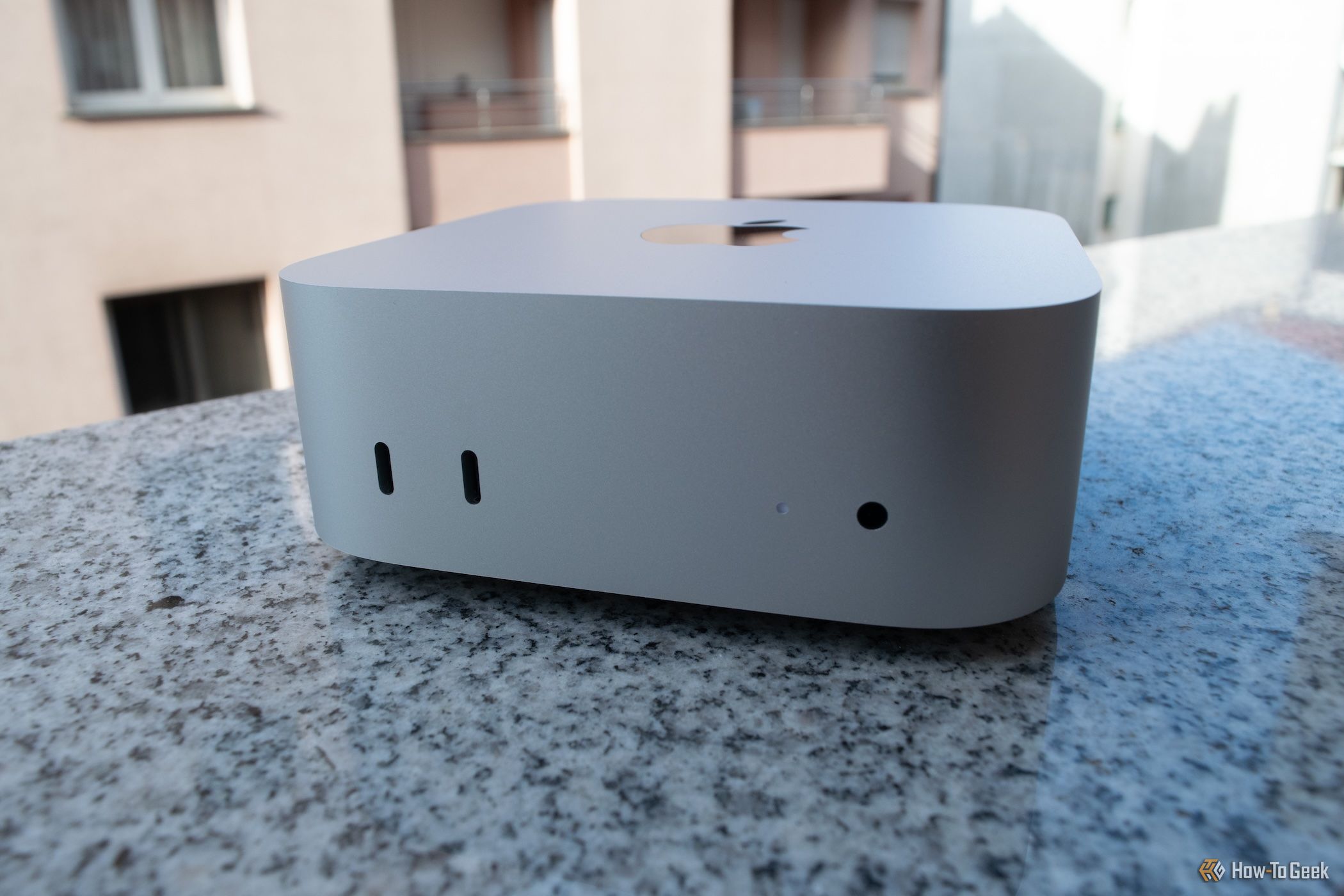 Front side of an M4 Mac Mini with the front-mounted ports in the foreground. 