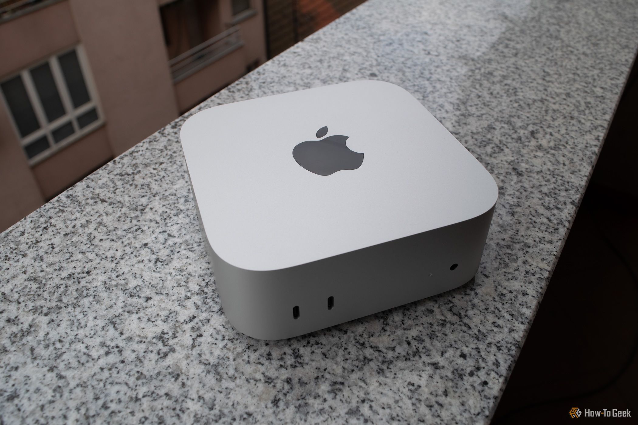 An M4 Mac Mini on a balcony.