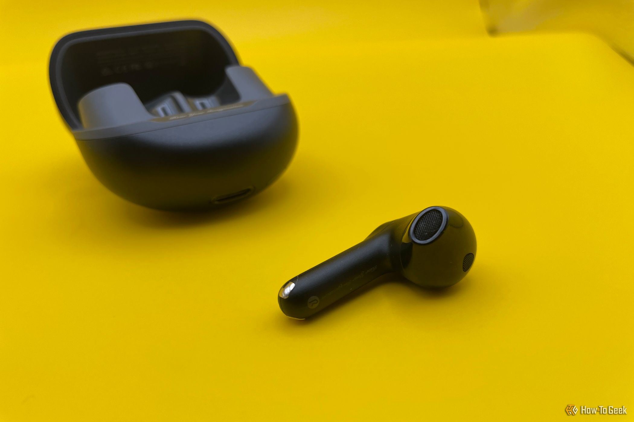 A single SoundPEATS Air5 Wireless Earbud.