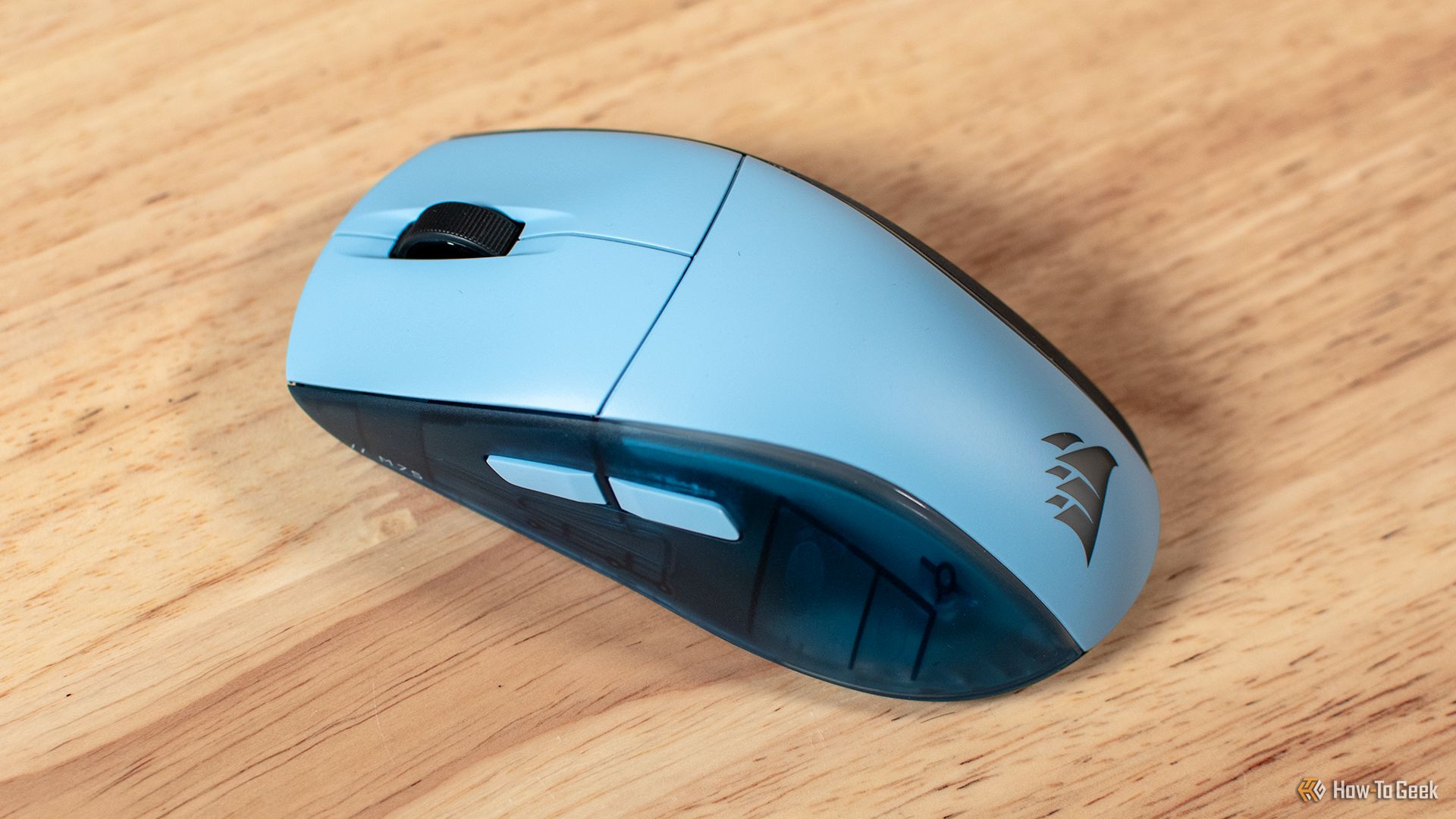 The Corsair M75 Wireless Mouse on a desk.