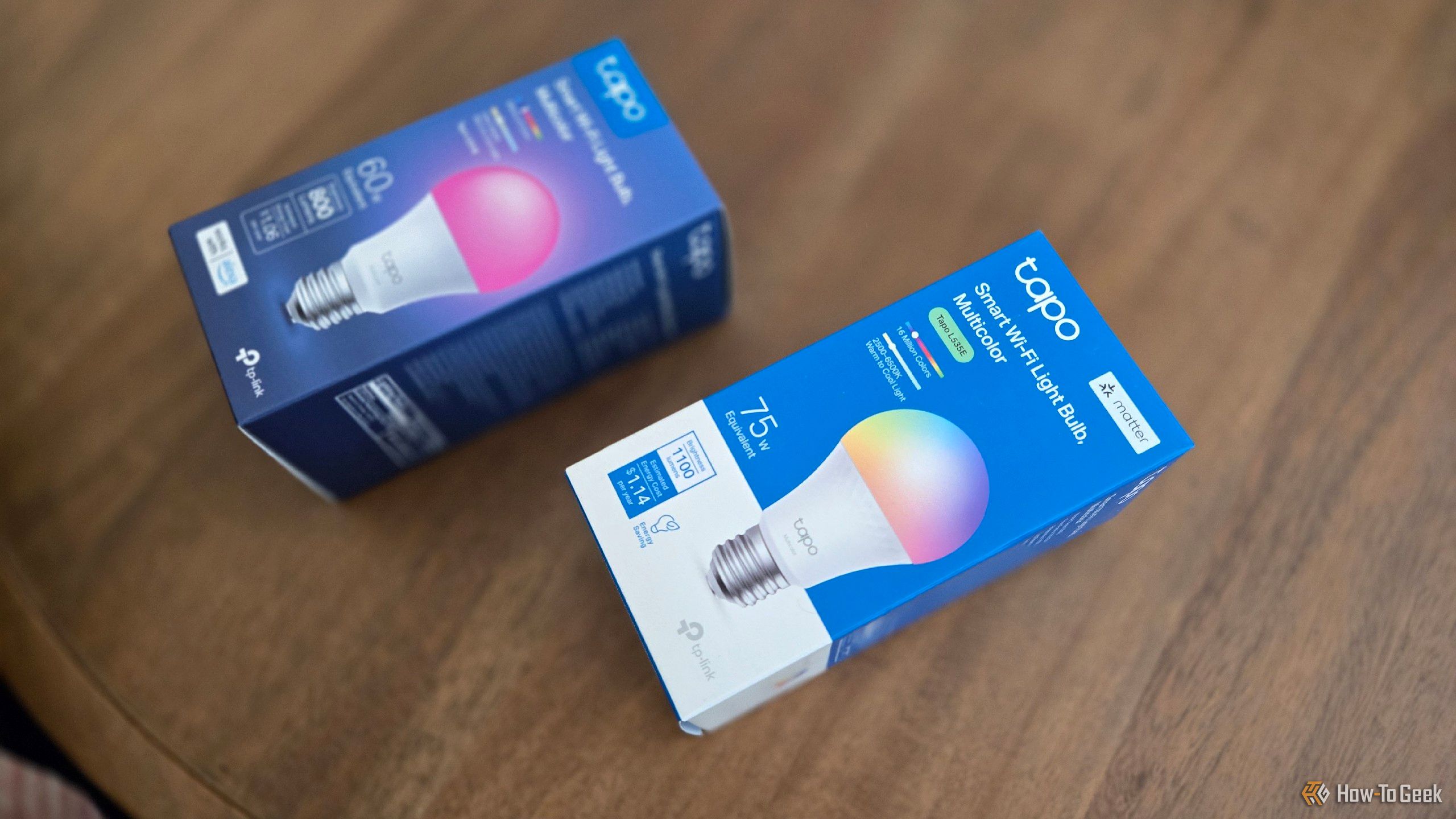 Two TP-Link Tapo smart bulbs side by side, one with Matter compatibility.