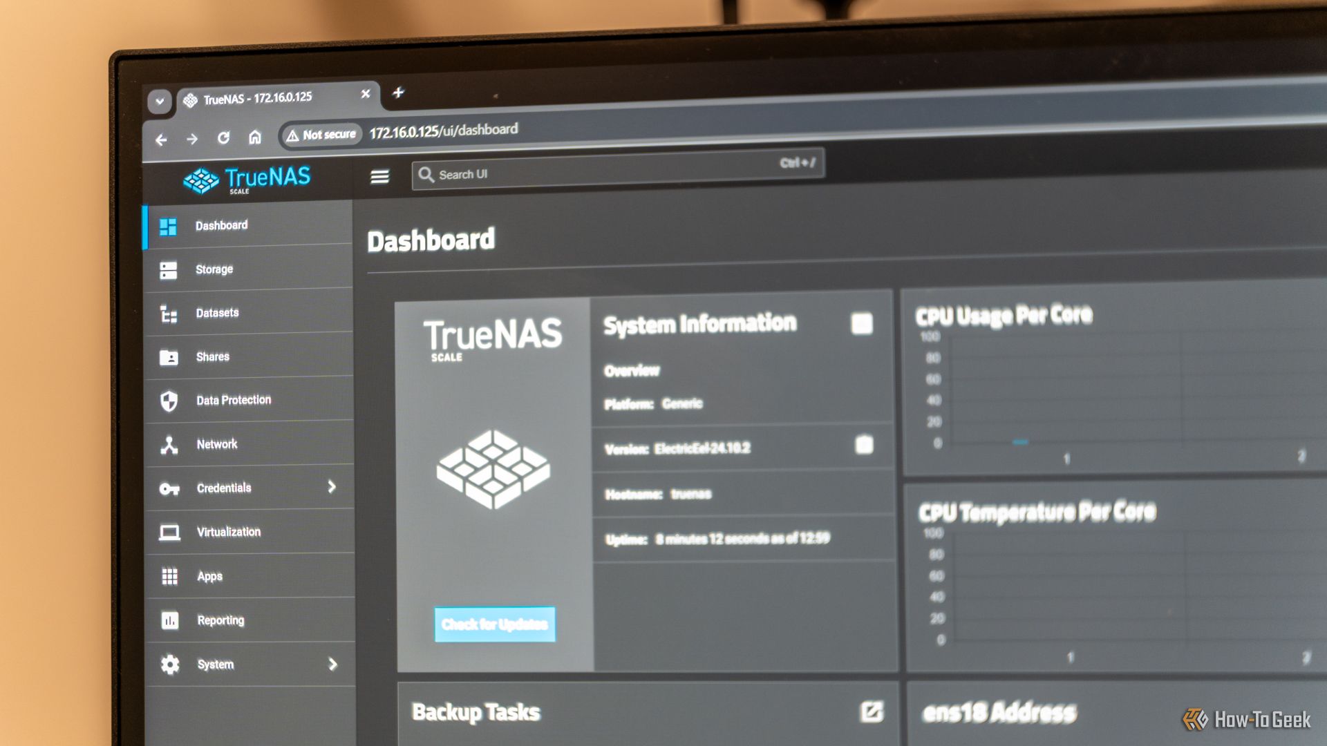 TrueNAS opened on a computer monitor showing the dashboard.