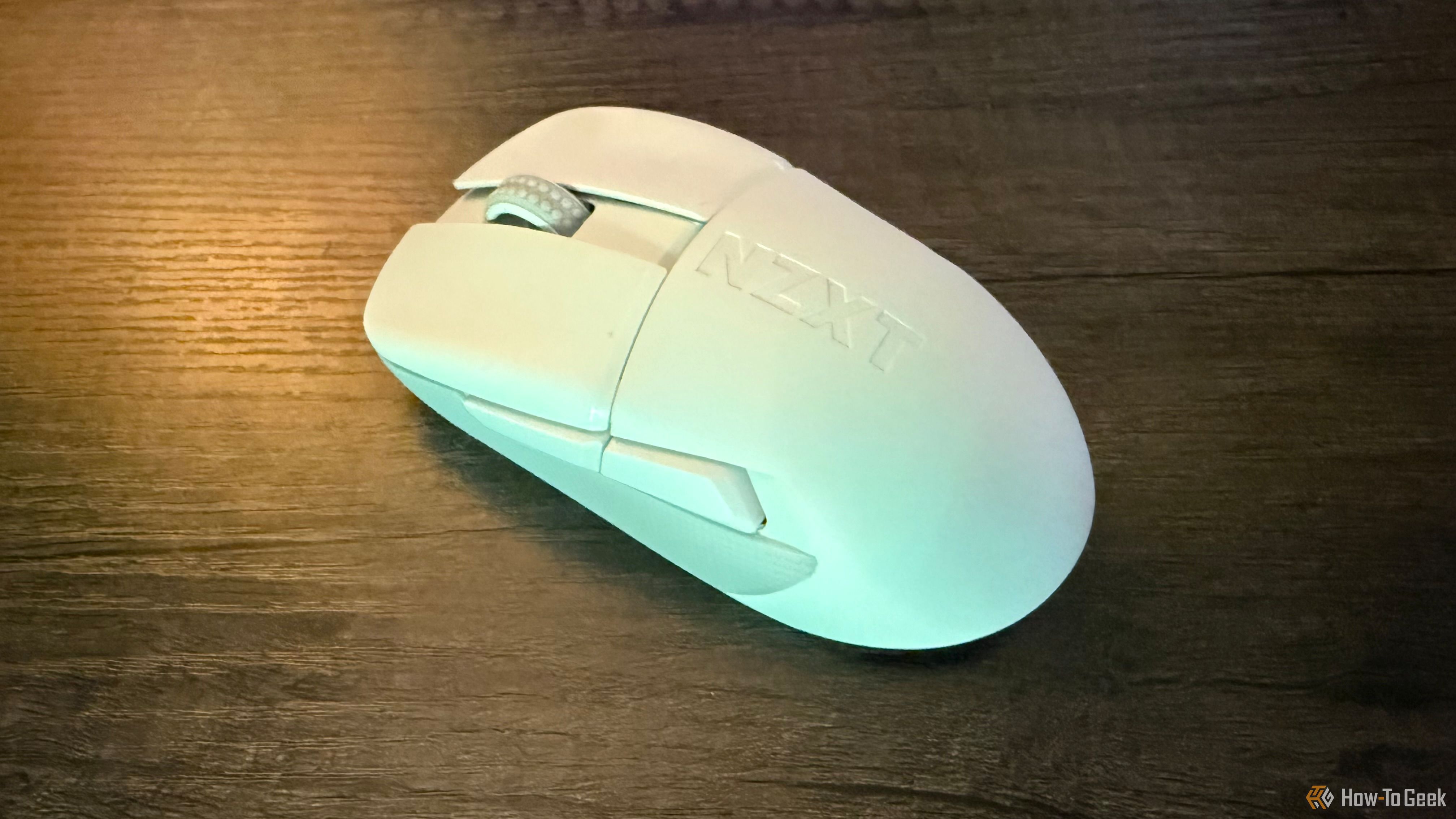 NZXT Lift Elite Wireless mouse on a table.