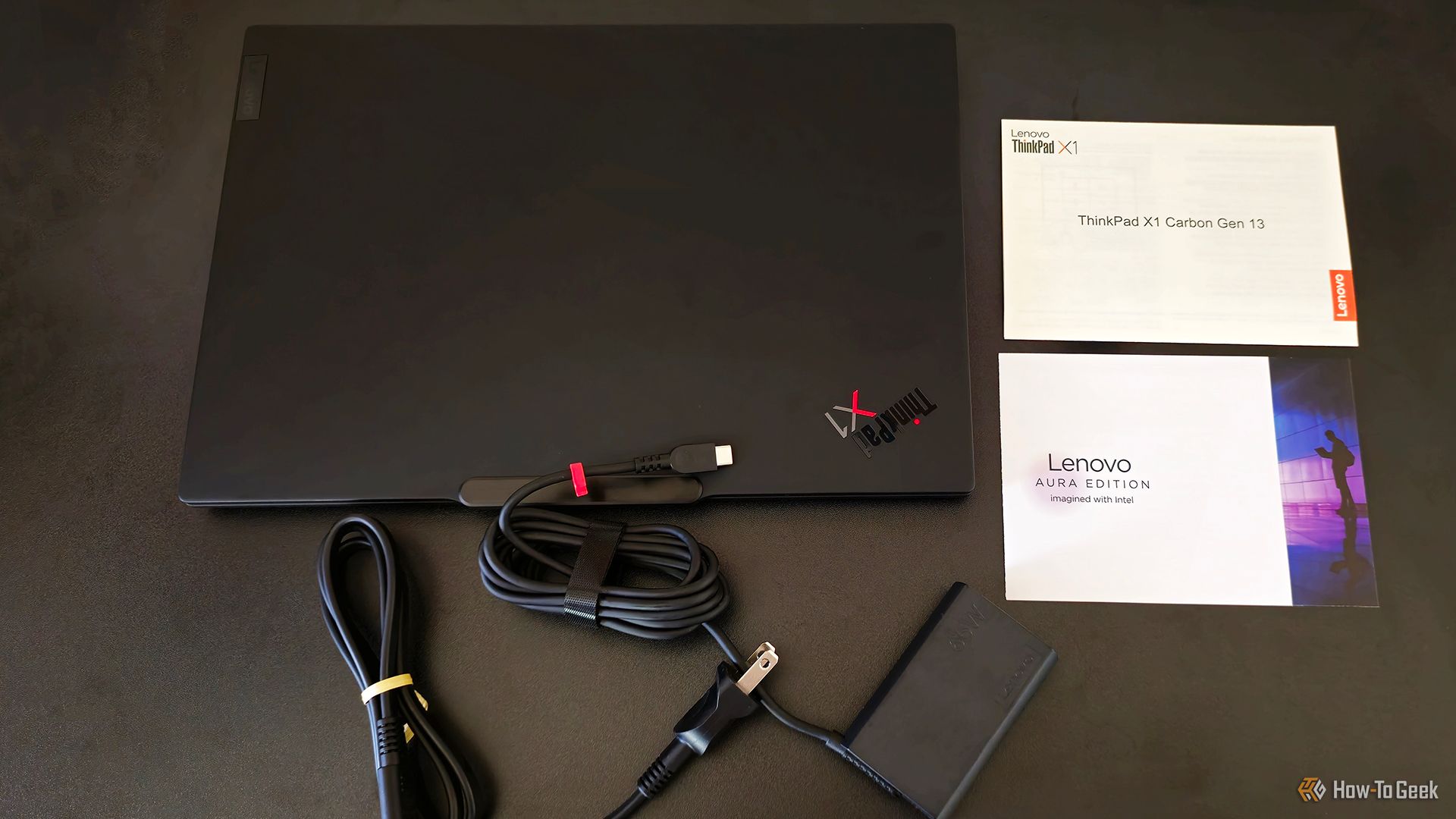 The Lenovo ThinkPad X1 Carbon Gen 13 Aura Edition's box contents.