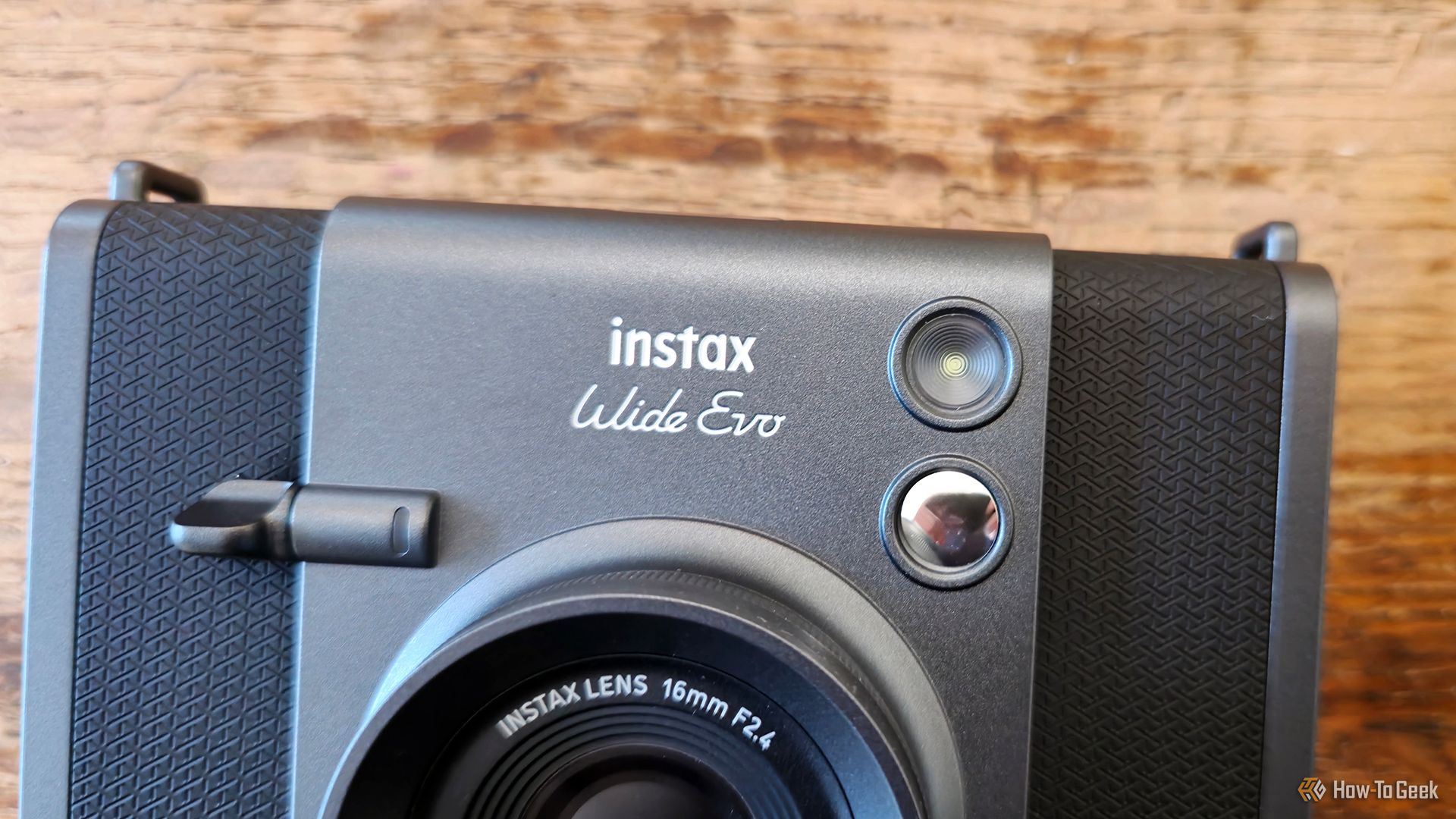 The sensor and the selfie mirror on the Instax Wide Evo hybrid camera.