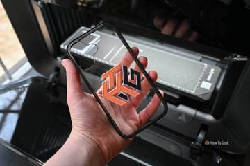 Person holding a phone case printed on by the EufyMake E1 UV Printer.