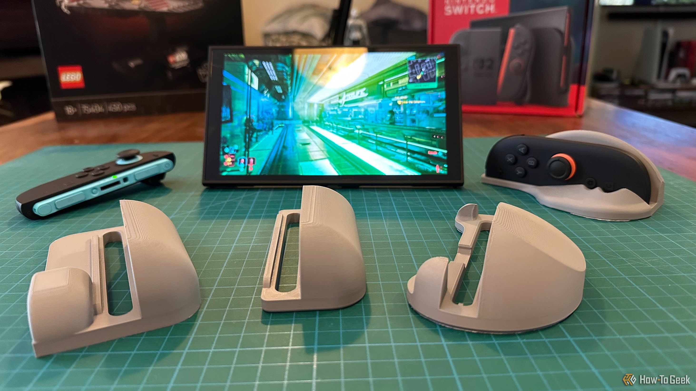 A Switch 2 surrounded by 3D-printed mouse shells.