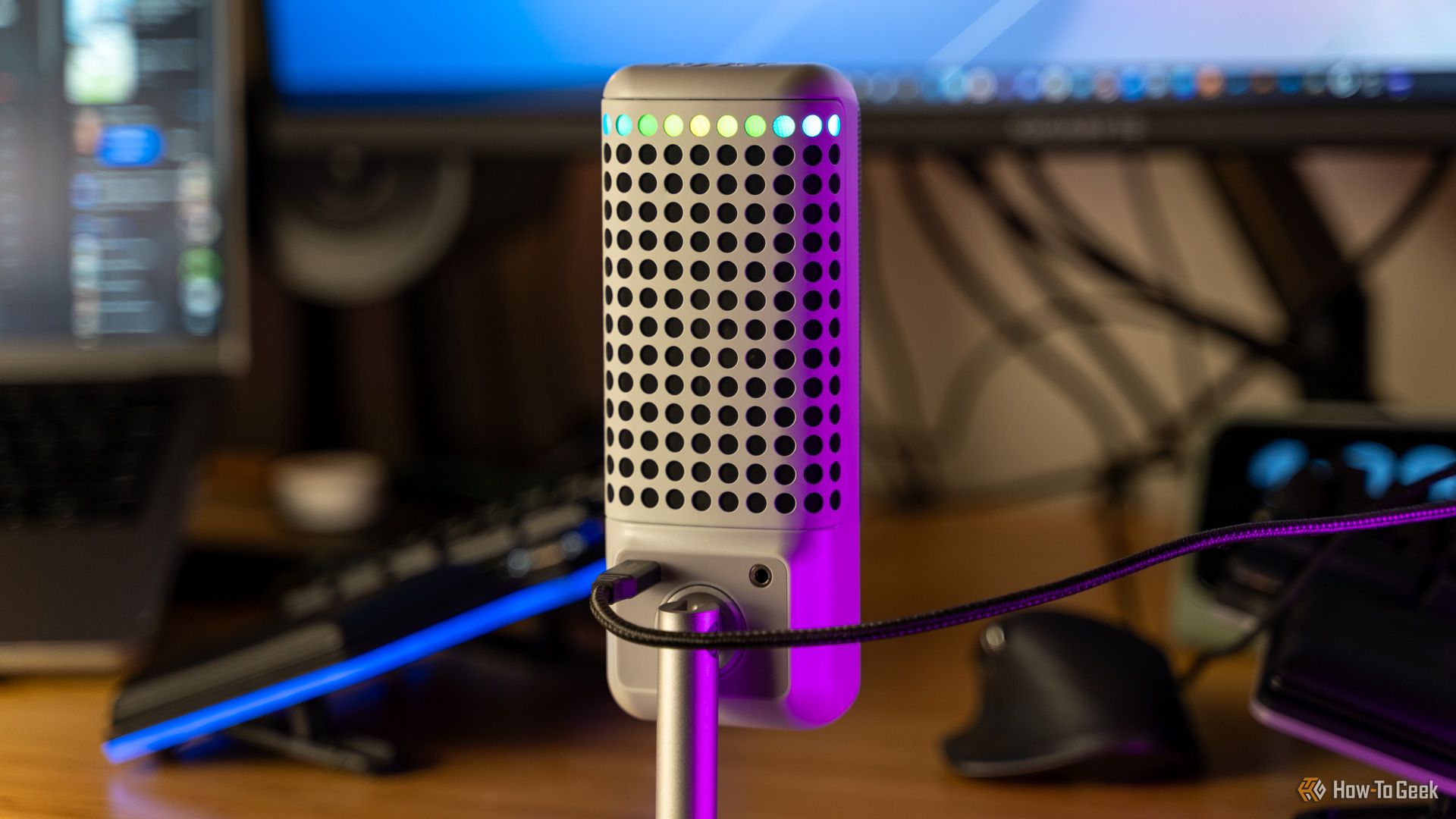 The back of the NZXT Capsule Elite Microphone showing the light bar, USB port, and 3.5mm headphone jack.