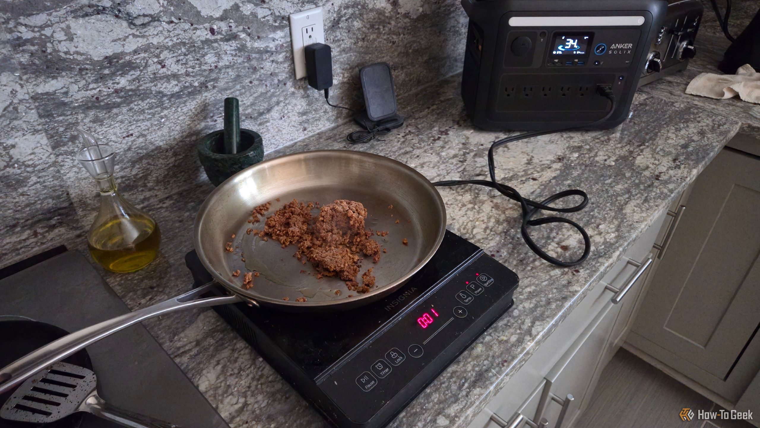 Cooking using an induction burner plugged into an Anker Solix C1000.