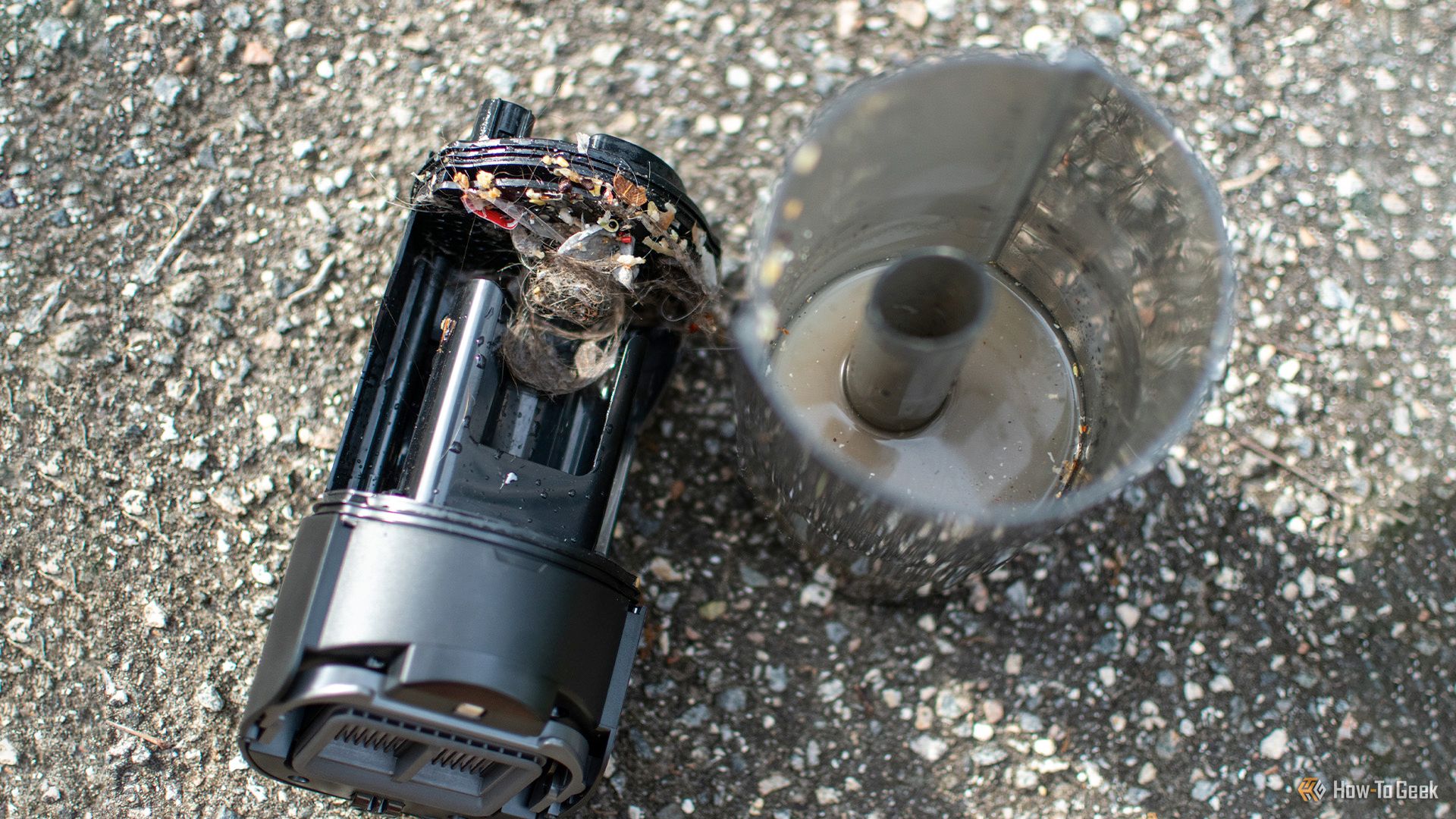 Emptying out the Dreame H12 Pro Flexreach vacuums dirty water tank.