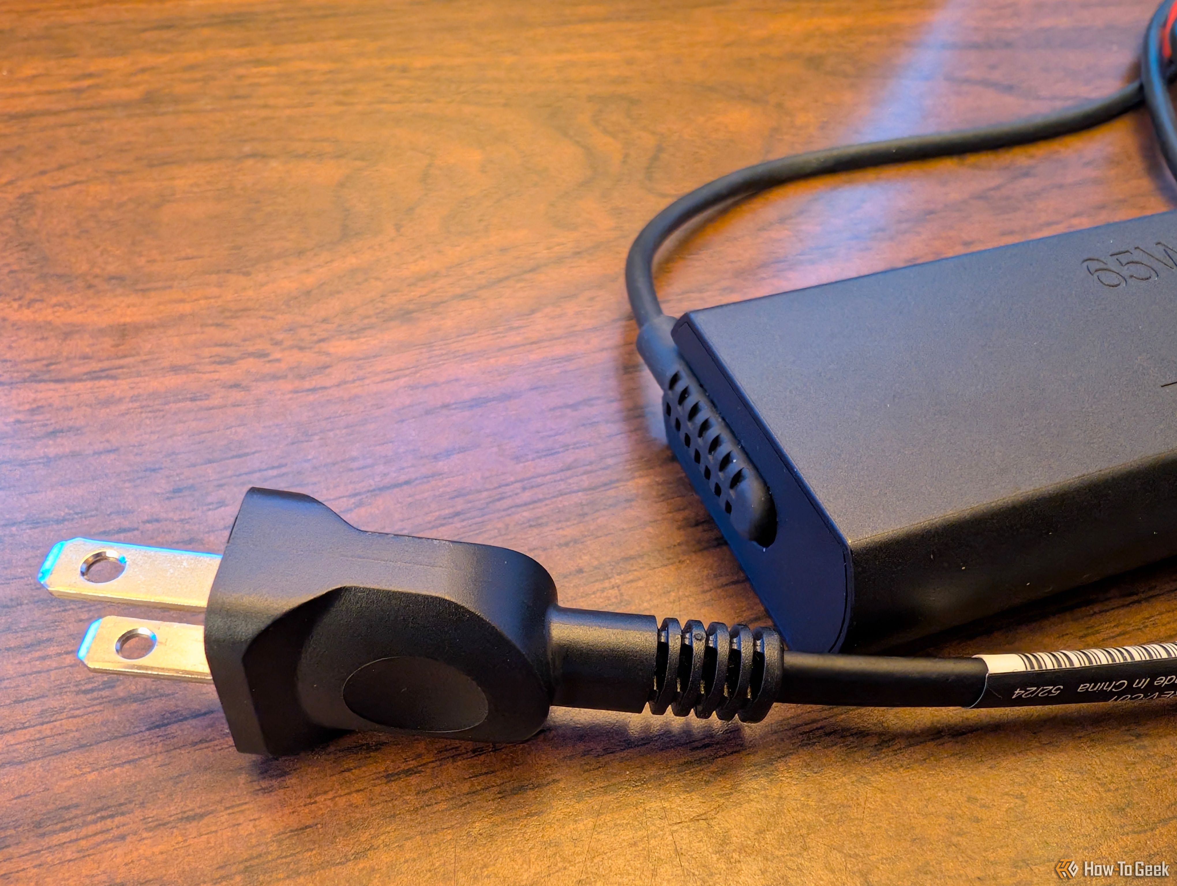 The charger for the ThinkPad X1 2-in-1 Gen 10 Aura Edition.