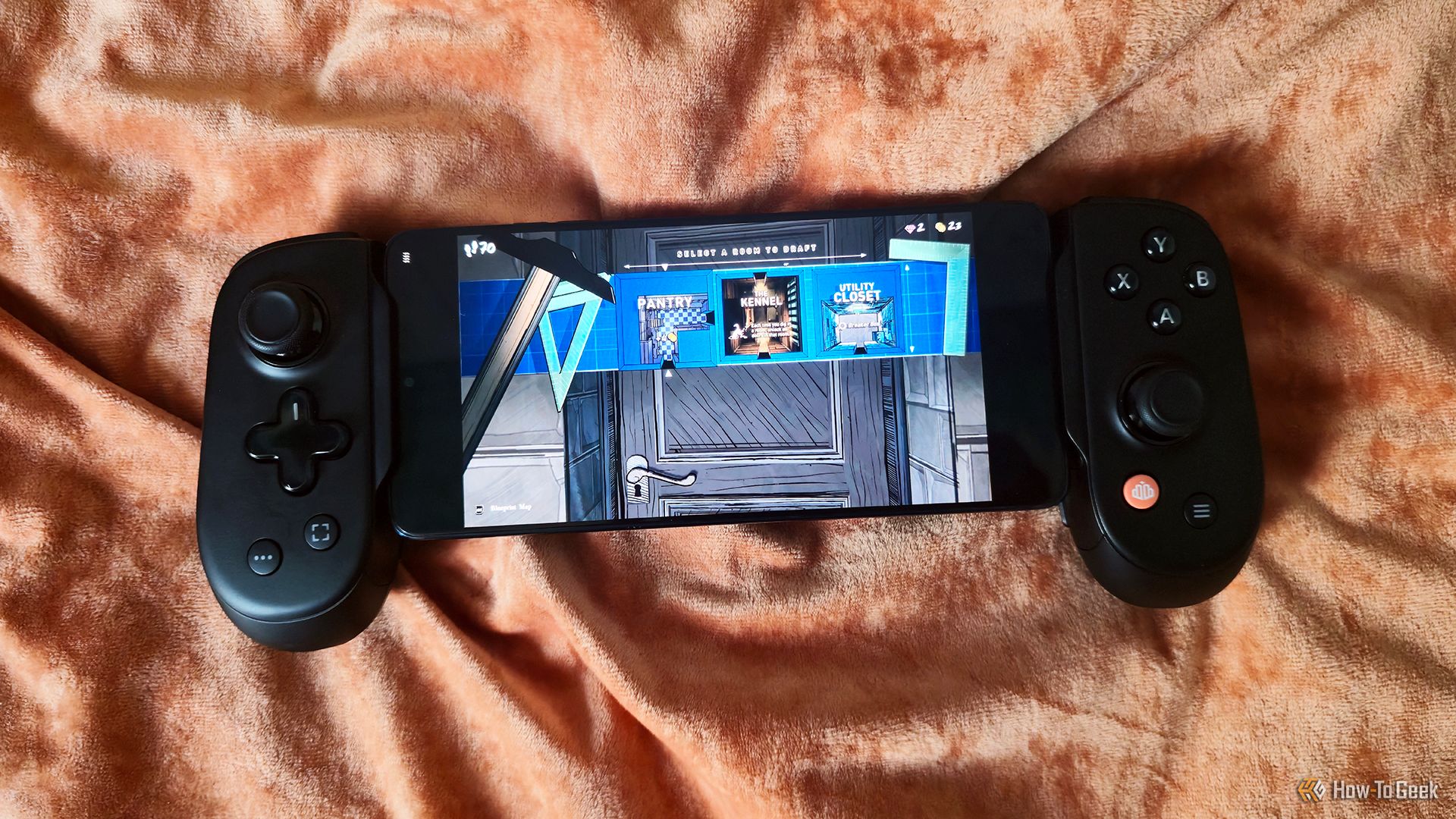 The Backbone Pro playing the game 'Blue Prince.'