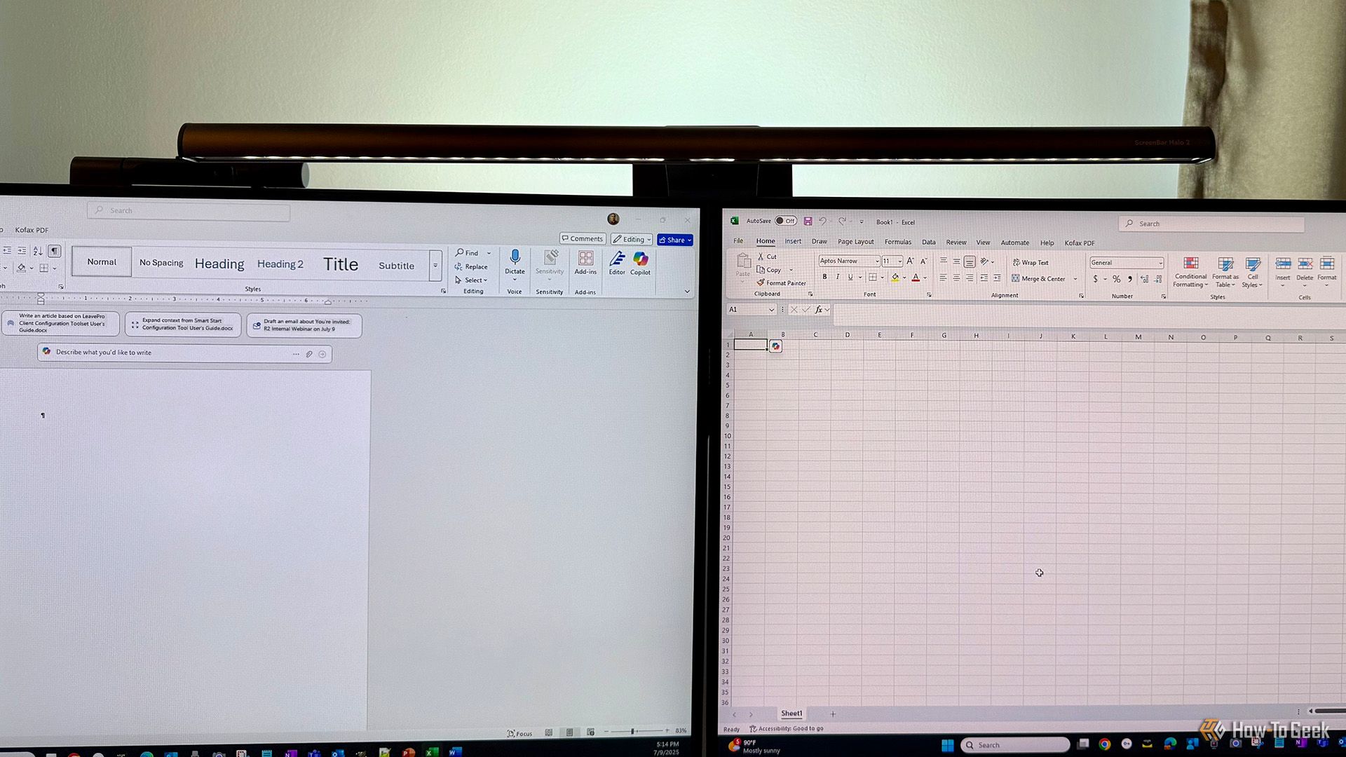 BenQ ScreenBar Halo 2 on top of and between two monitors.