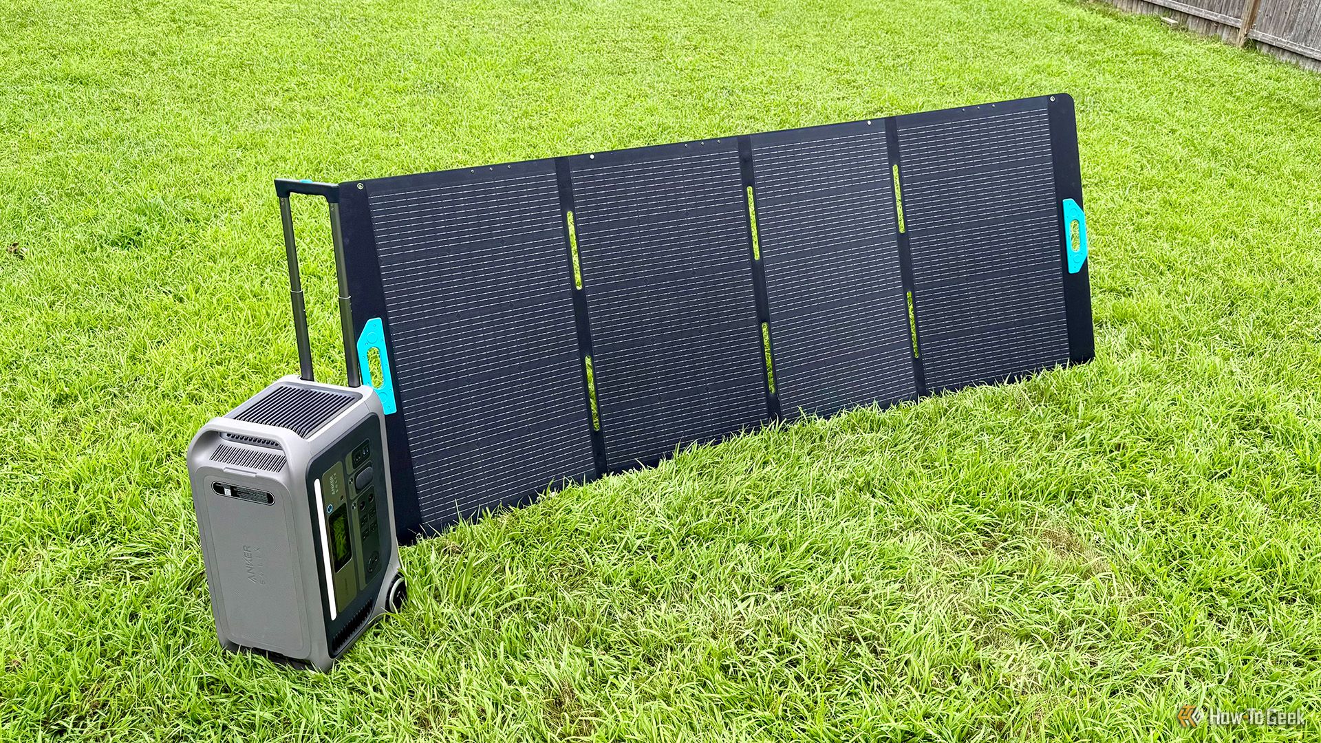 Anker SOLIX F3000 Portable Power Station and Anker SOLIX PS400 Portable Solar Panel on grass.
