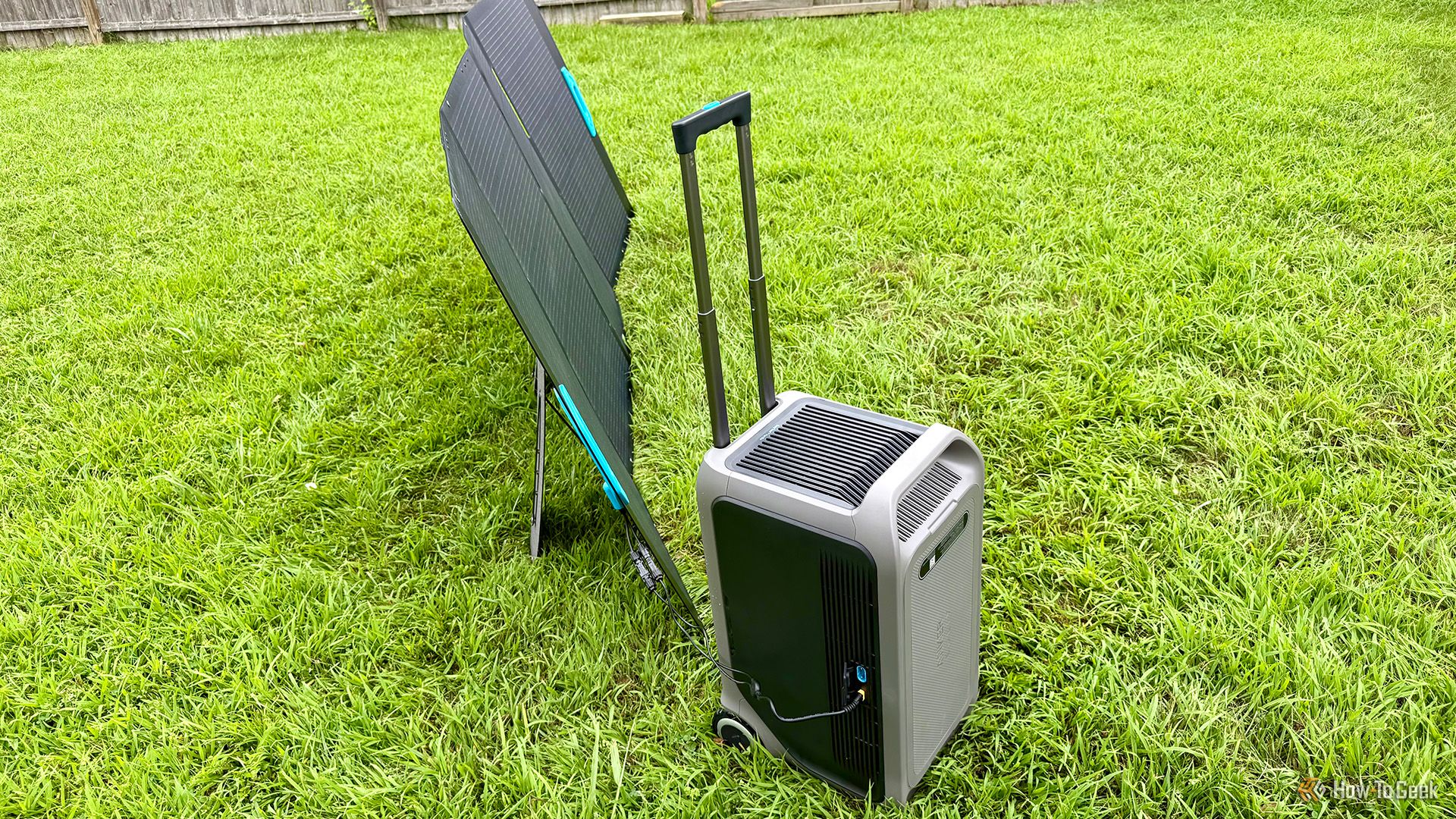 Anker SOLIX F3000 Portable Power Station and Anker SOLIX PS400 Portable Solar Panel on grass.