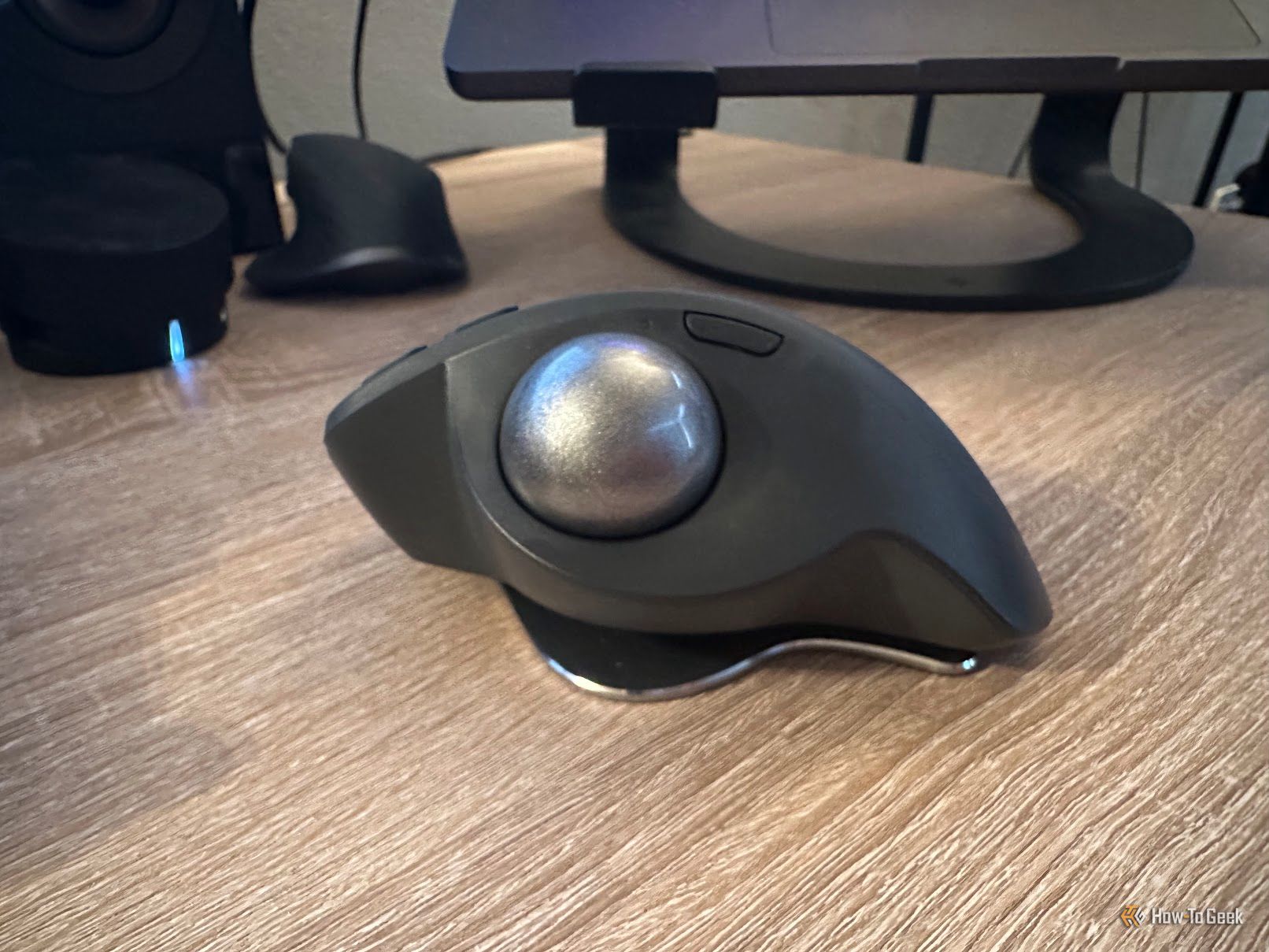 A Logitech MX Ergo S on a table.