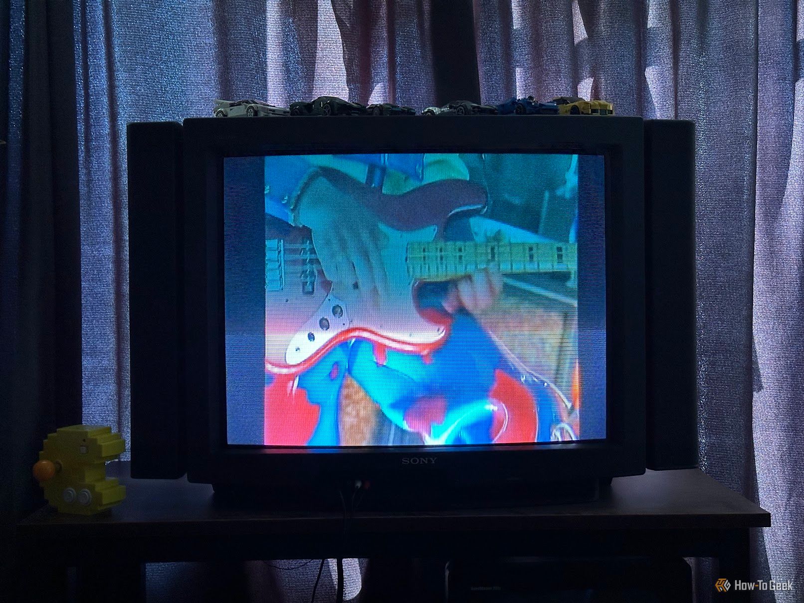 Black bars visible on the sides of a video on a CRT TV.