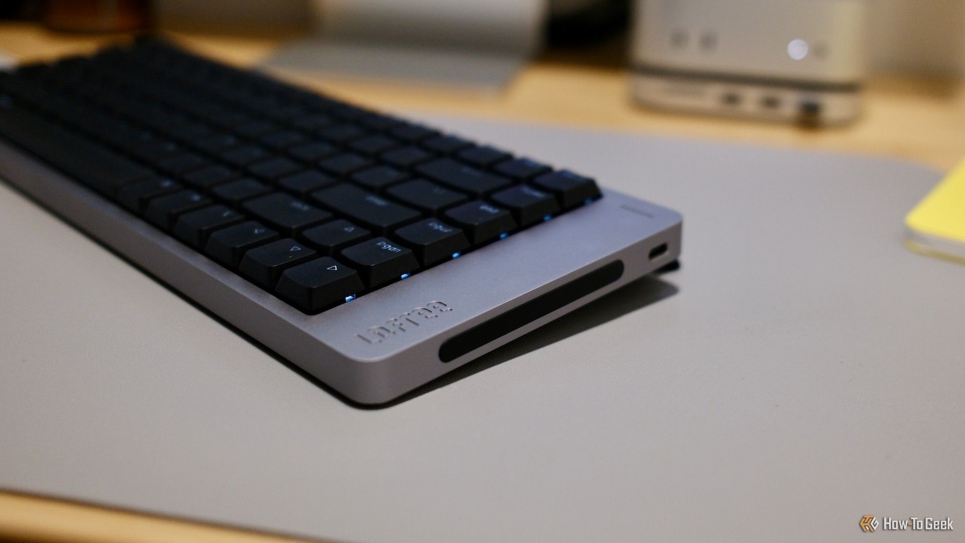 A close up of the Lofree Flow 2's right side with touch bar.