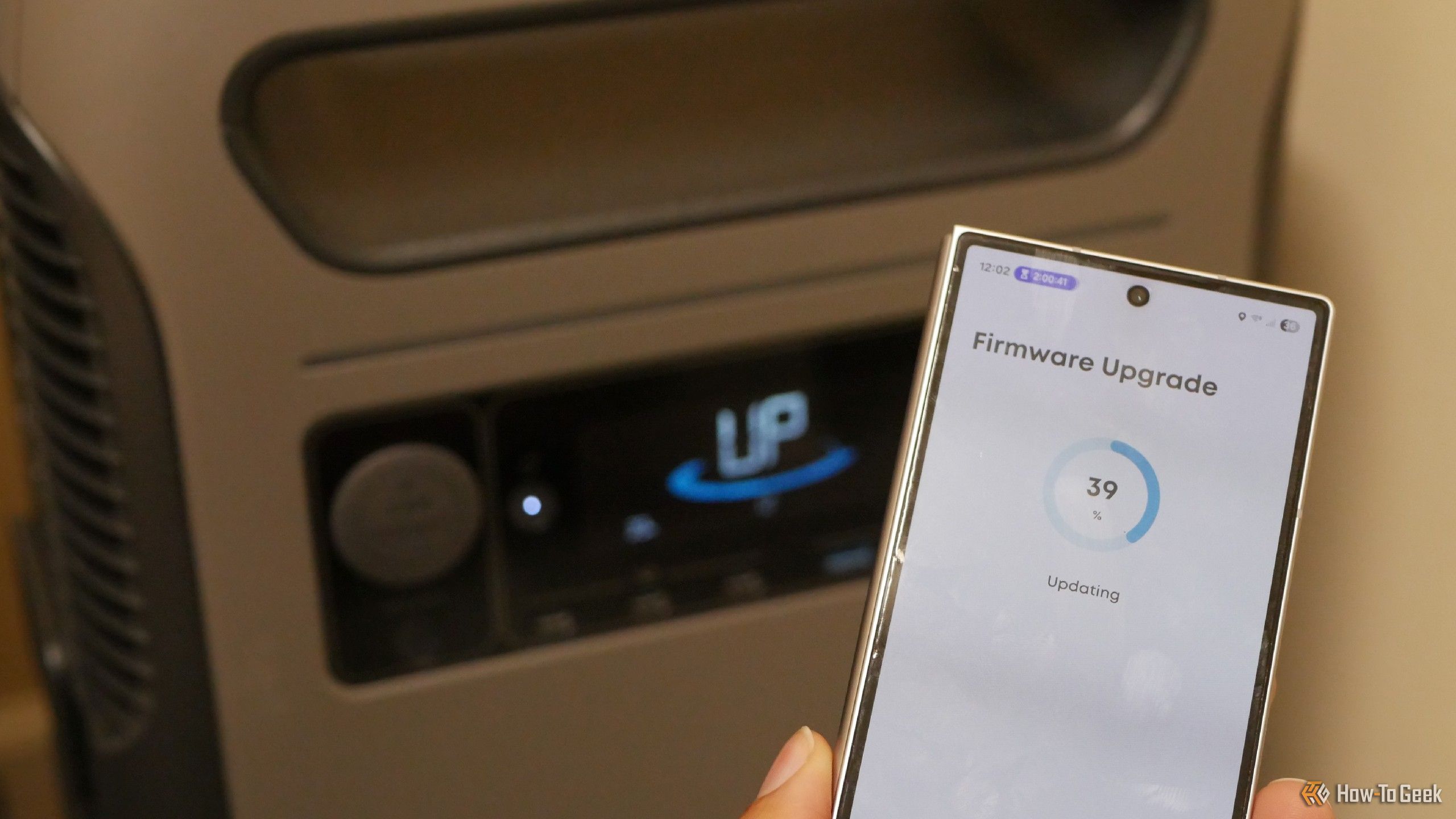 Firmware update for Anker SOLIX F3800 Plus with Galaxy Z Fold 6 in the foreground.