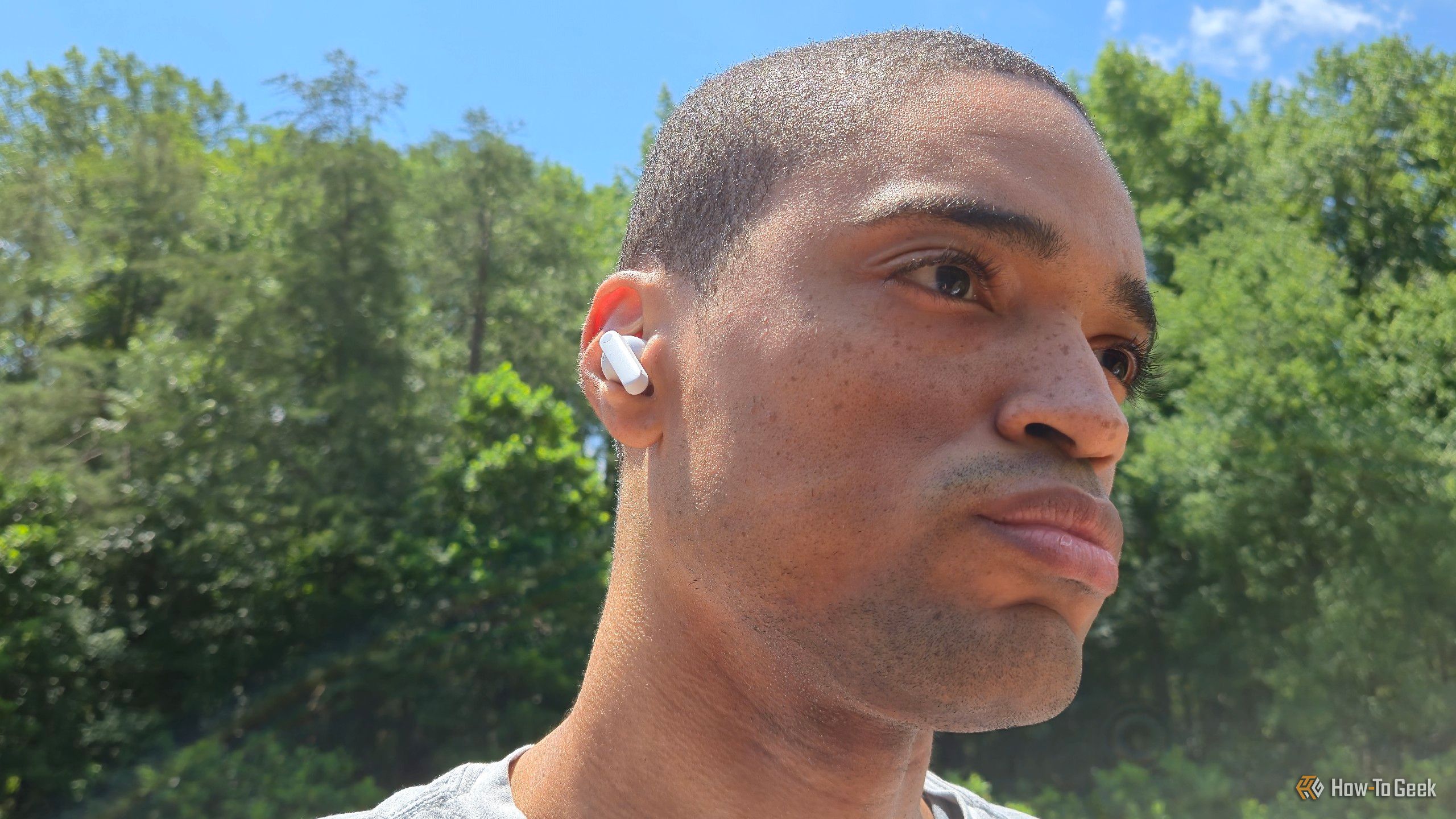 Man wearing CMF Buds 2 Plus.