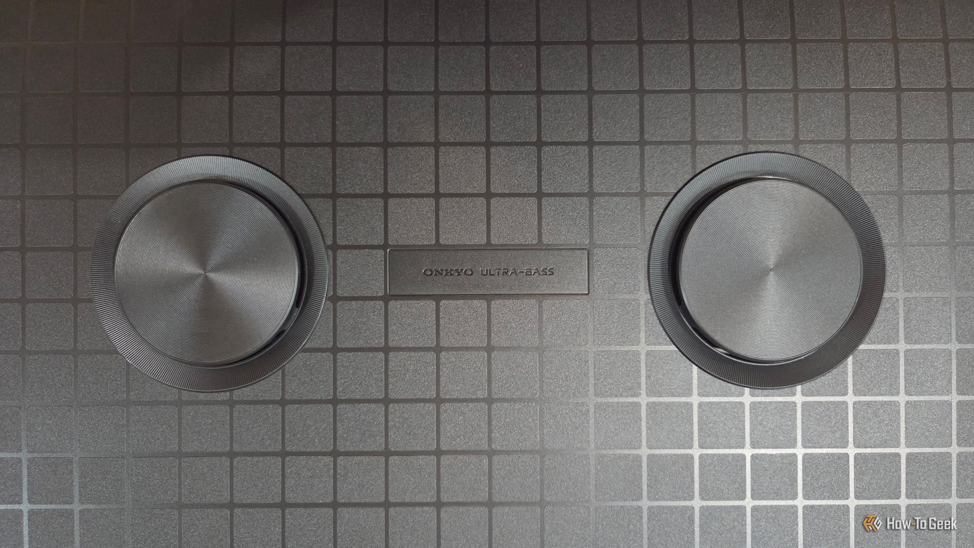Onkyo speakers on the back of the TCL QM6K TV. 