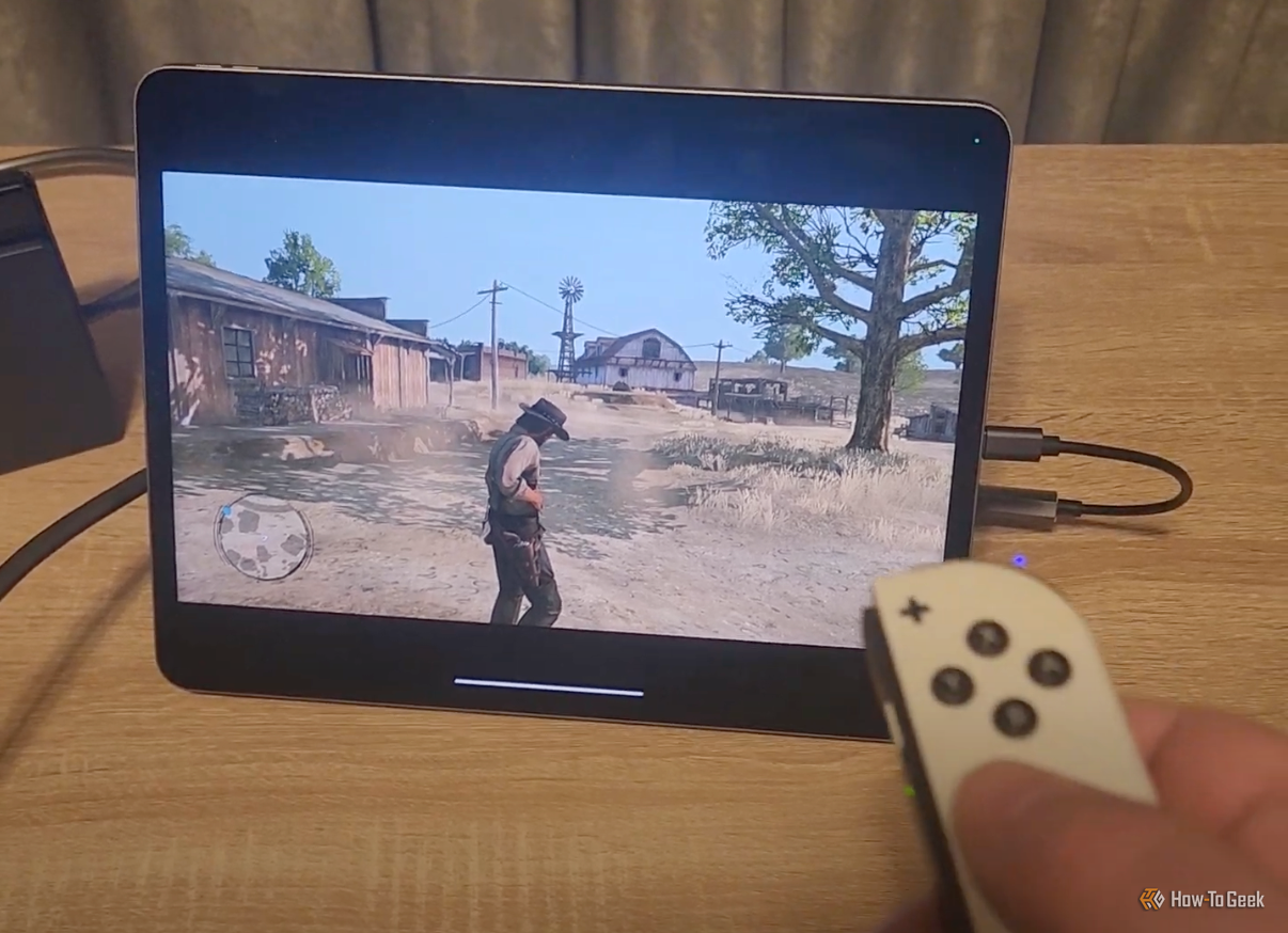 An iPad is acting as a USB monitor for an Nintendo switch.