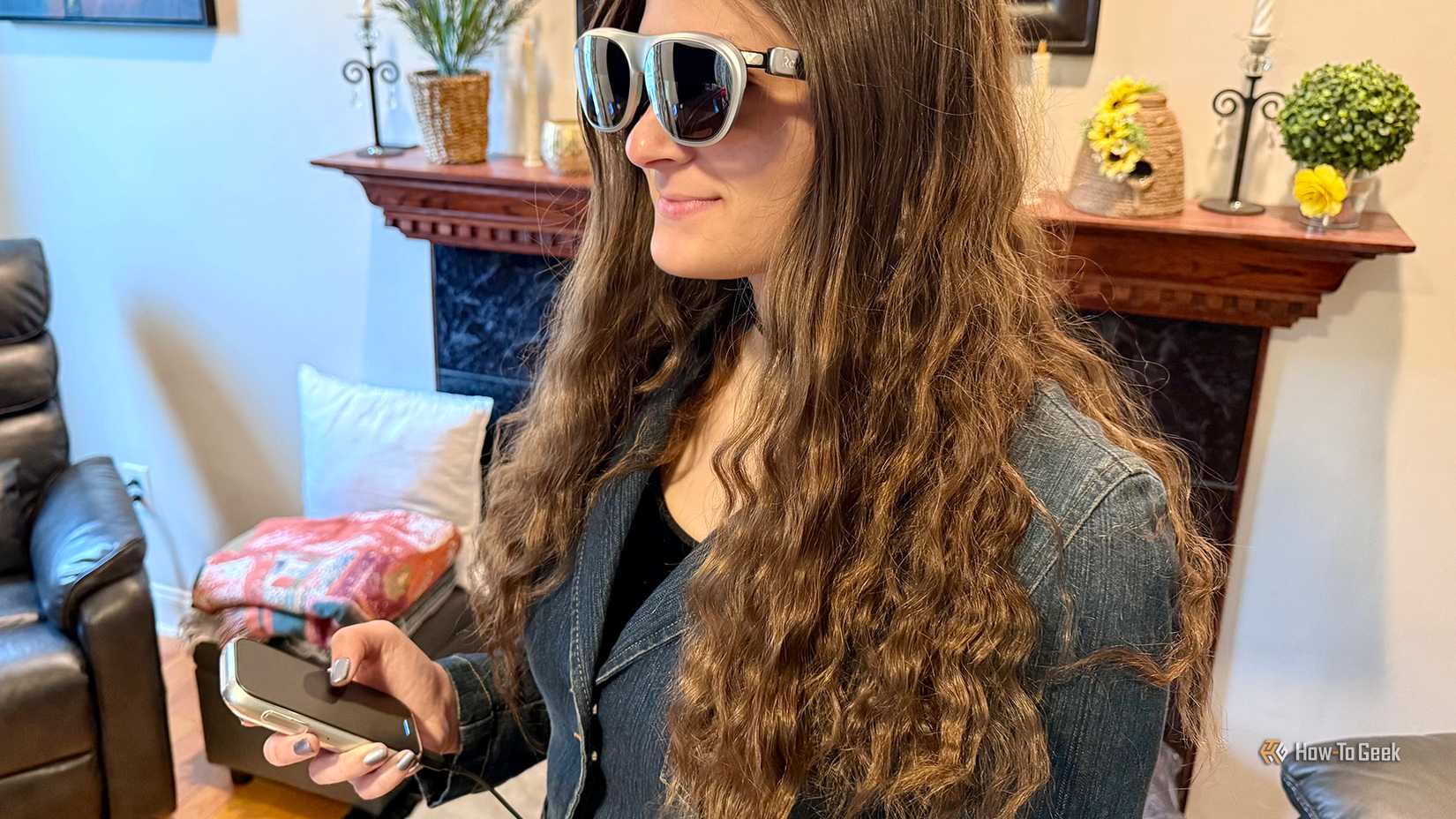 Woman wearing and using Rokid AR Spatial.