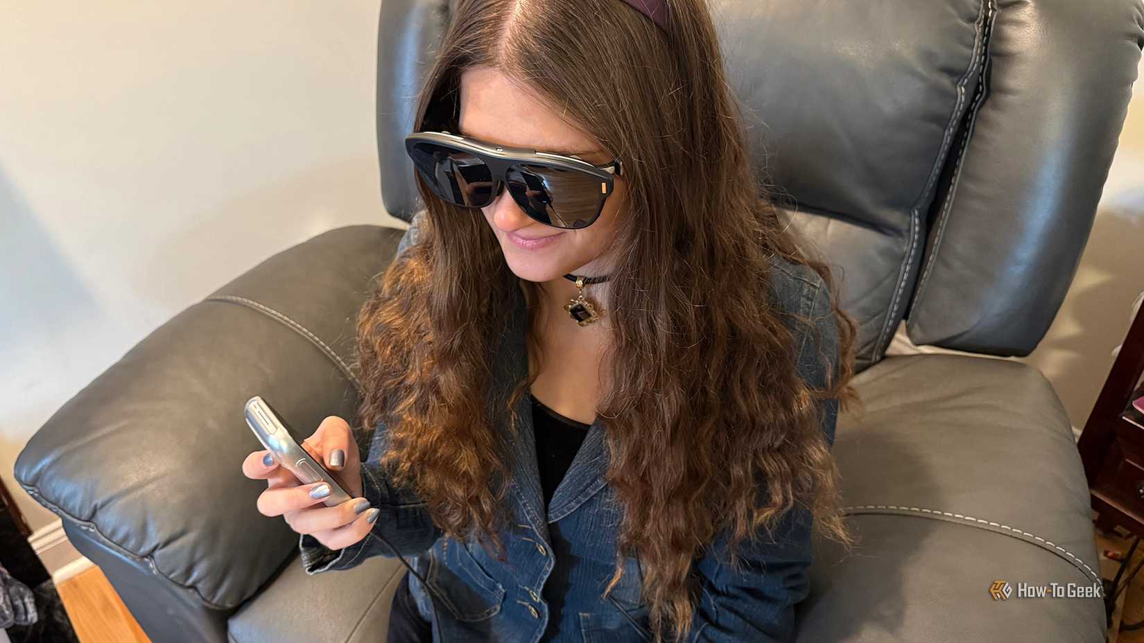 Woman wearing and using Rokid AR Spatial.