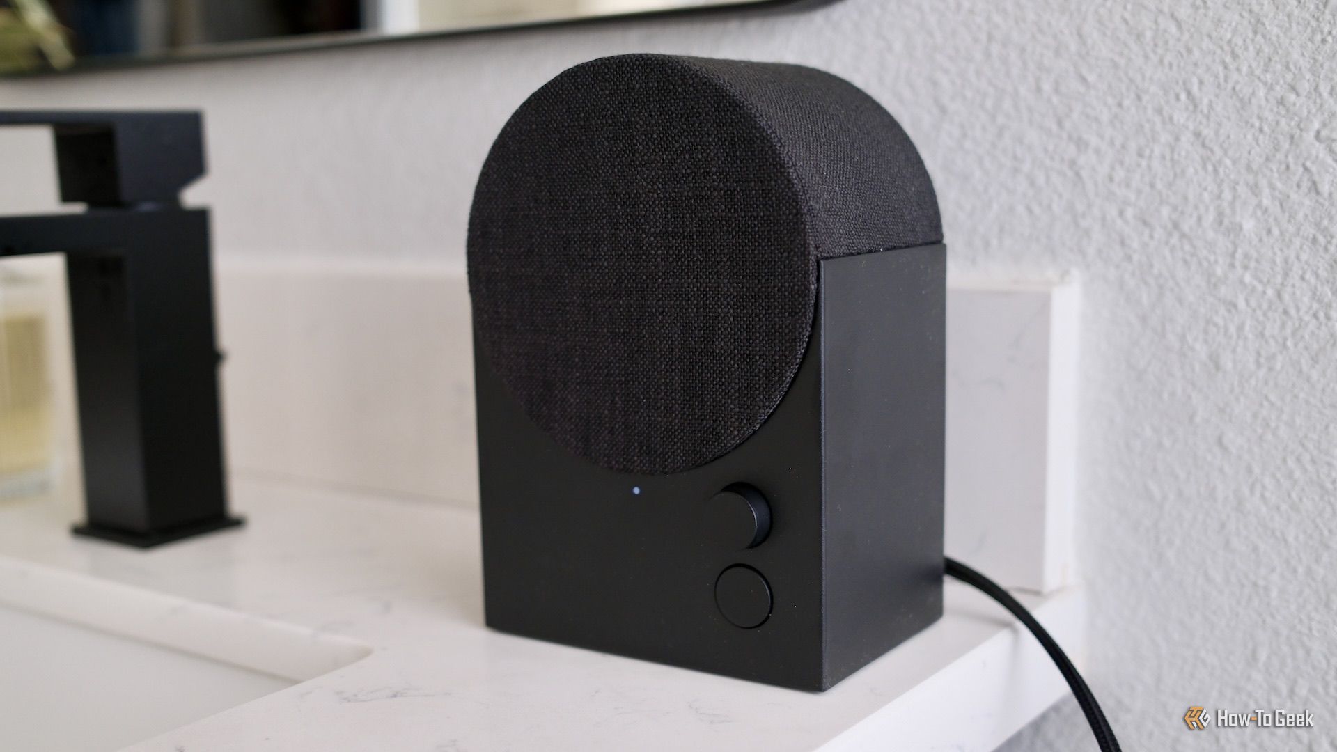 IKEA NATTBAD showing its front volume knob and Spotify Tap button.