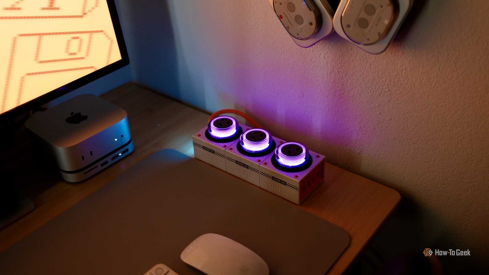 Genki Moonbase glowing in purple on a desk.