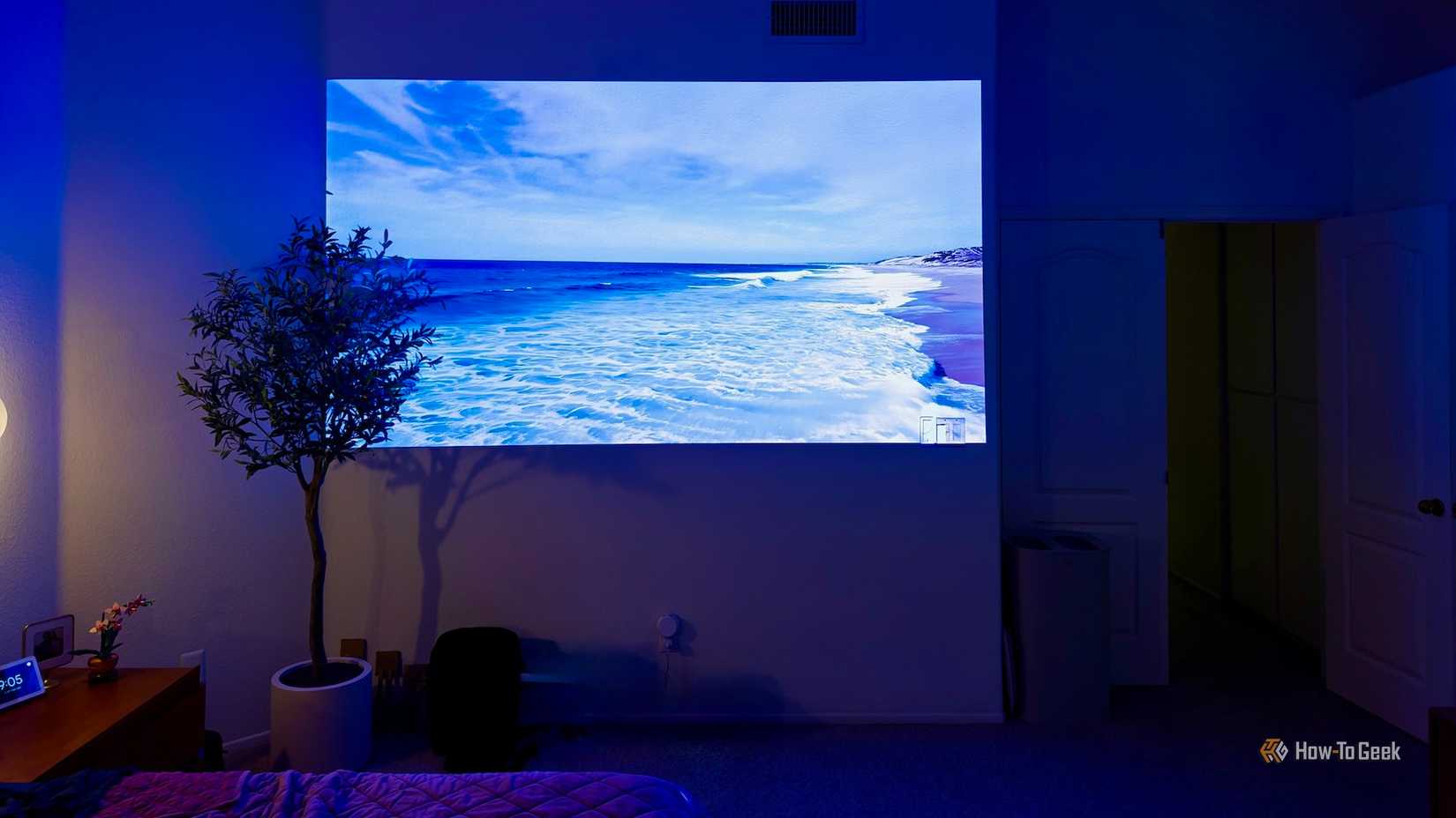 Picture of a shoreline projected on an indoor wall.