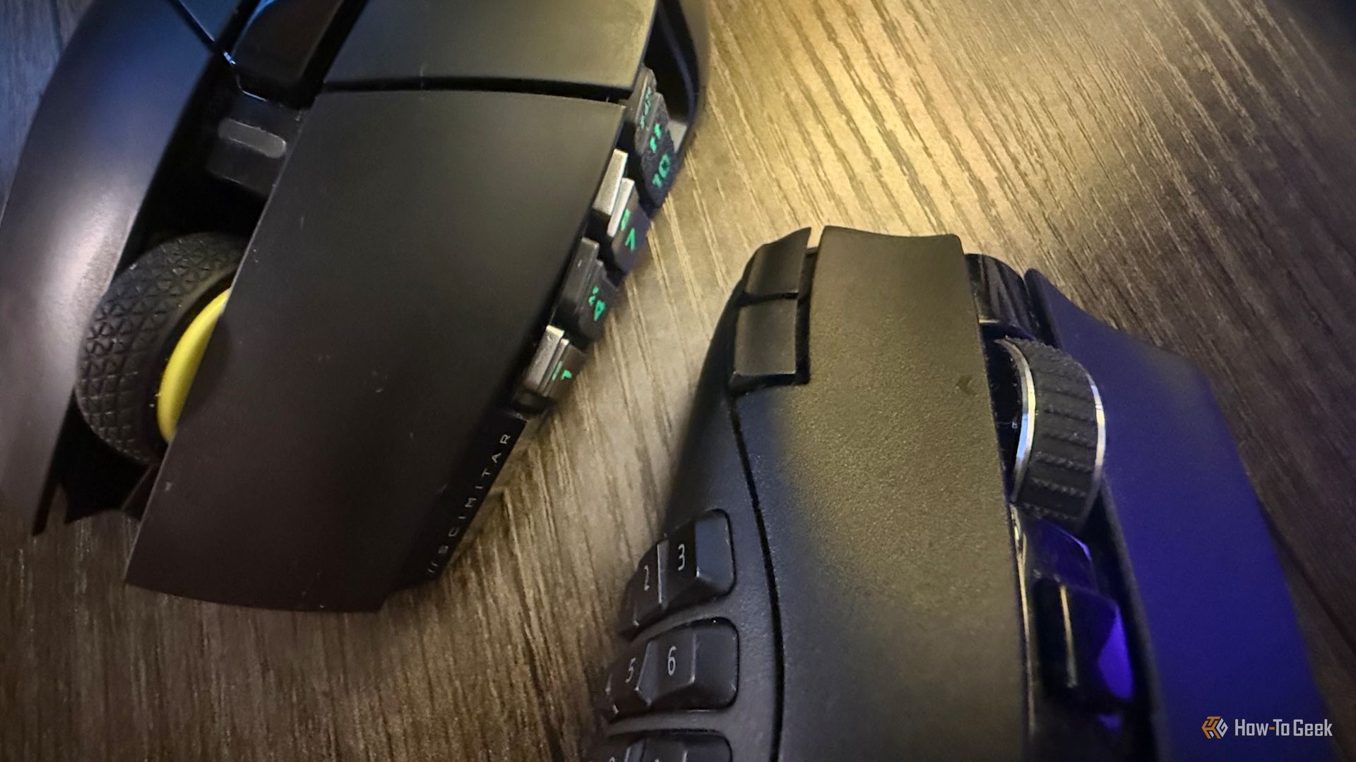 The mouse buttons of the Corsair Scimitar Elite Wireless SE gaming mouse and Razer Naga V2 Hyperspeed.