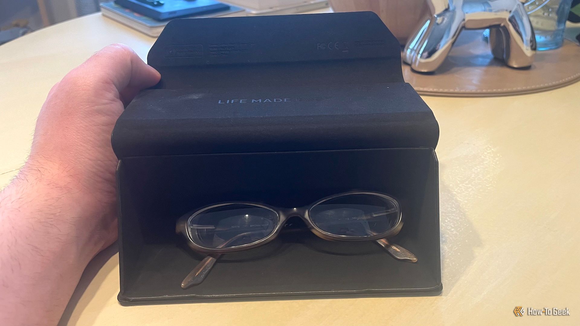 The Satechi Findall glasses case with a pair of glasses inside.